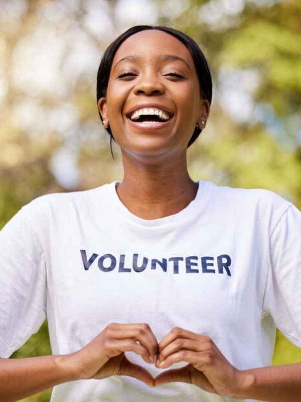 heart-hands-african-volunteer-woman-with-sign-care-support-charity-outdoor-nature-forest-environment-show-love-happy-person-helping-community-service-with-empathy_590464-216873